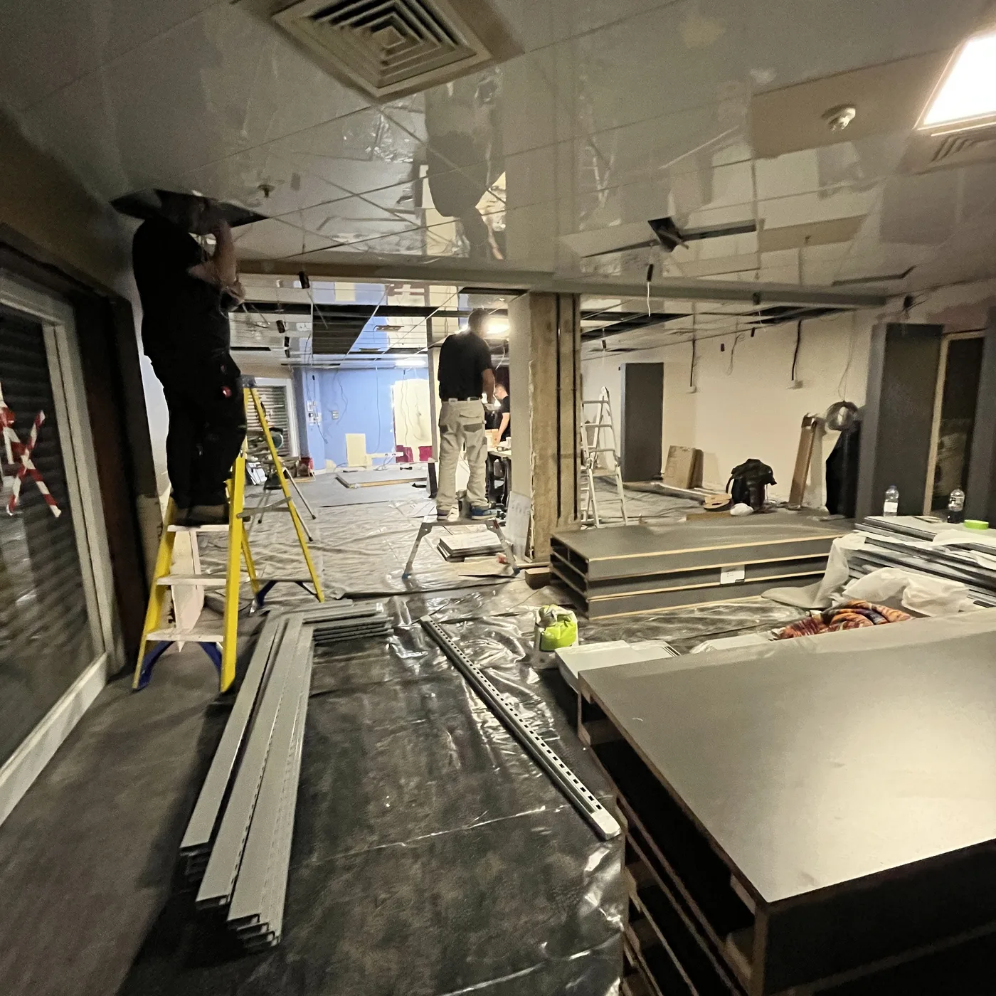 Technology being installed inside a commercial space during construction